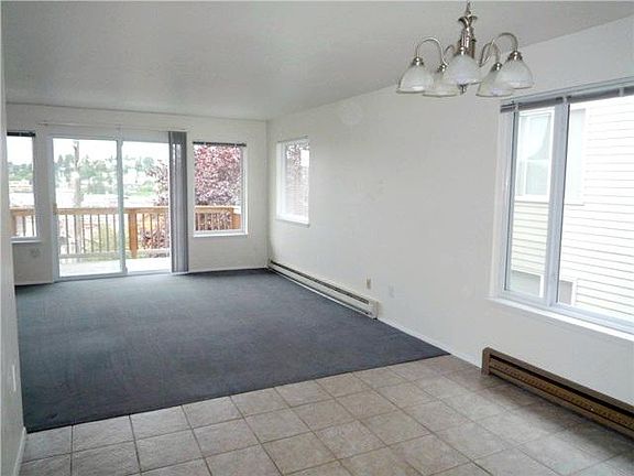 Dining room with large window.