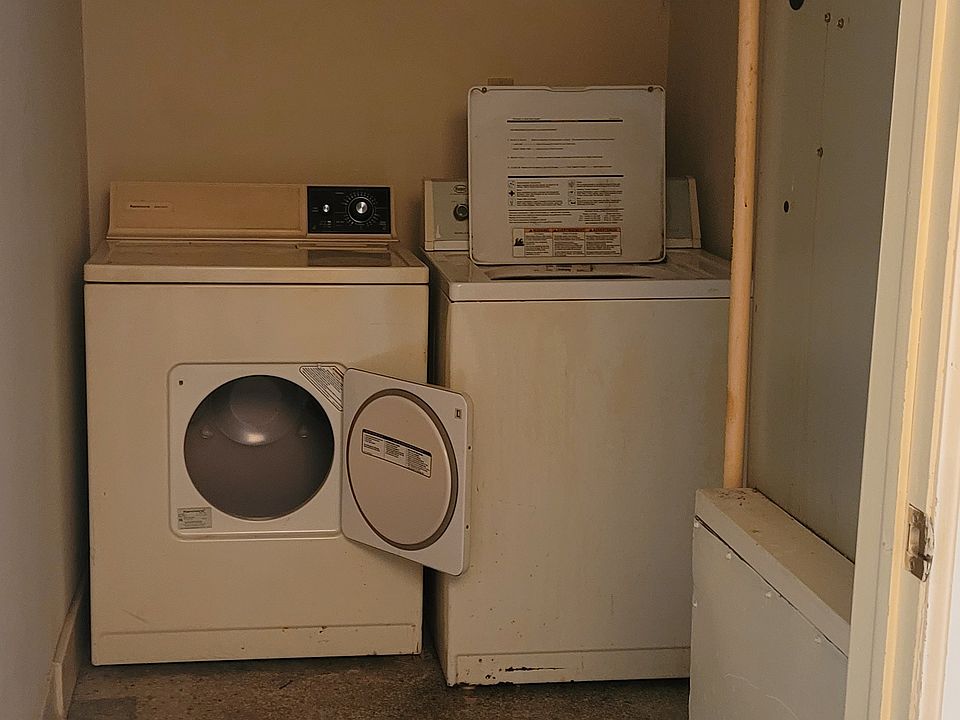 Laundry room with washer and dryer. Also the furnace is in this area.