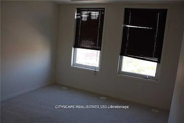 5625 Oscar Peterson Blvd #16 — Photo 2