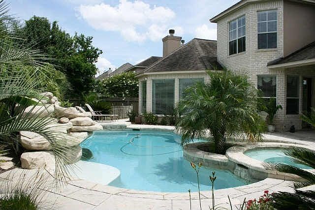 Tropical Pool with Waterfall and Spa