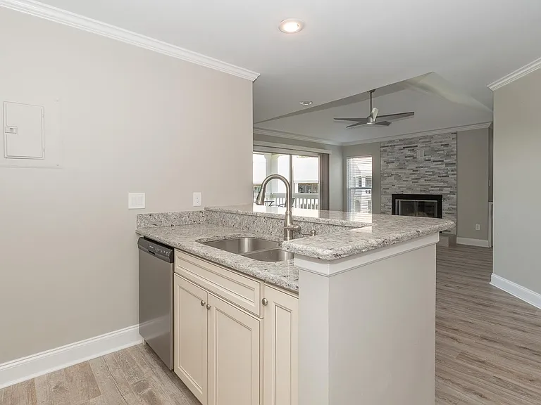 Top floor has a cathedral ceiling which gives it a more spacious feel. Plus you will not hear anyone above you unlike first or second floor condo.
