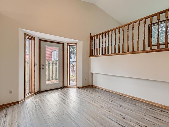 Large dining room with door to the deck for entertaining.