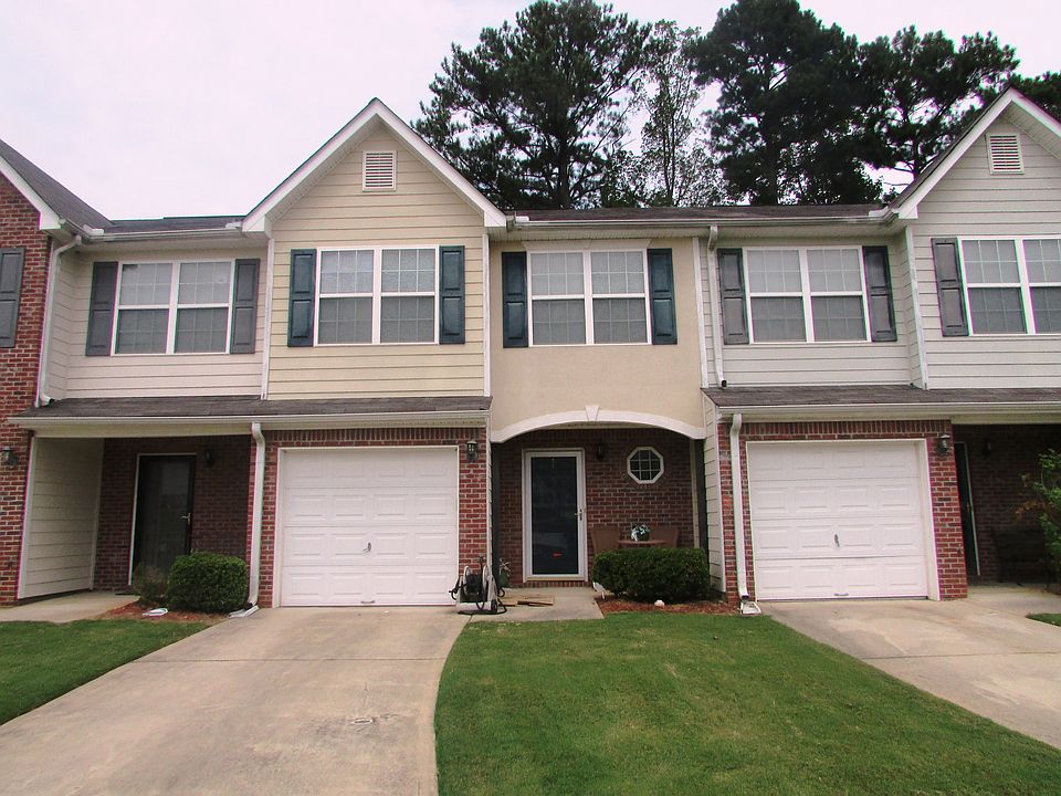 Brick front and 1-car garage