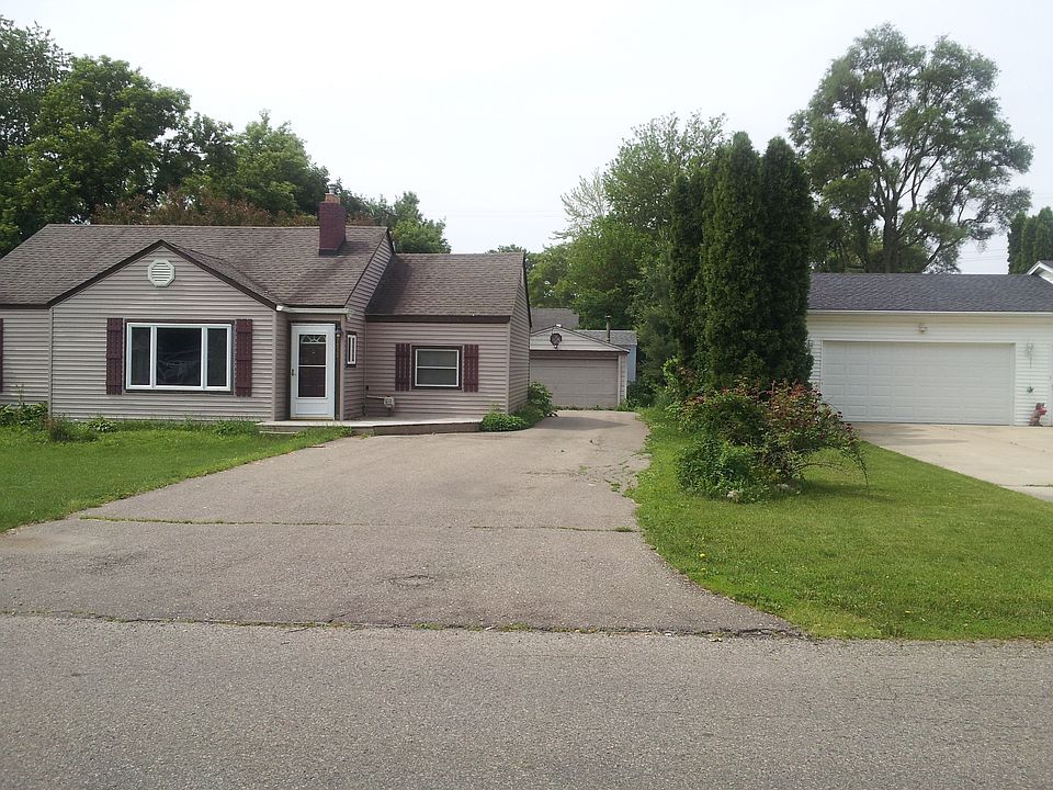 Front with 2-car garage