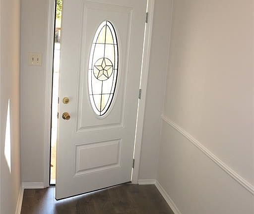 Nice-sized Foyer with a coat closet.