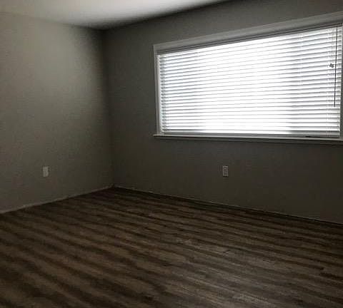 Master bedroom, which looks on to private backyard