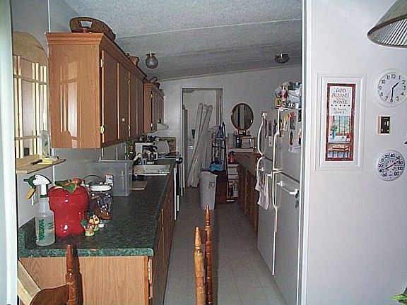 Kitchen eating area to laundry