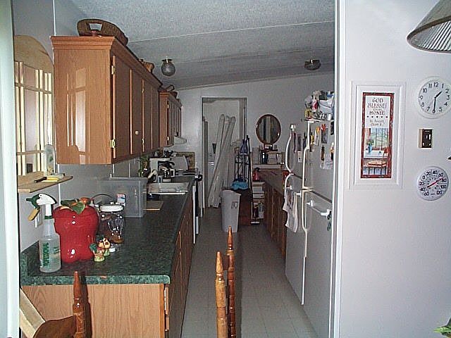 Kitchen eating area to laundry