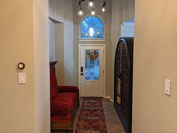 Foyer with vaulted ceiling