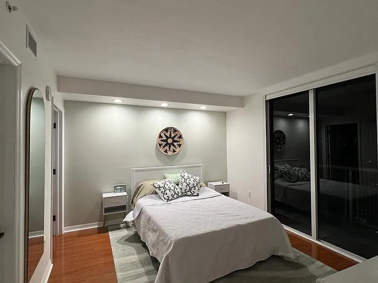 Large walk-in closet entrance on the left towards to the head of the bed.