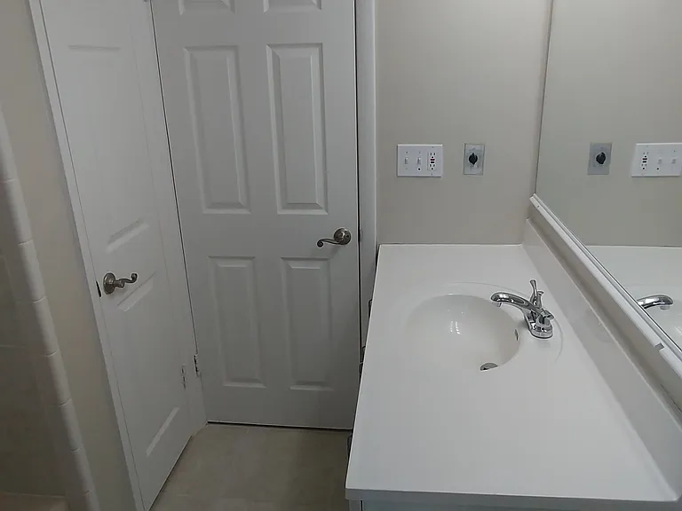 Guest bath looking toward hall.