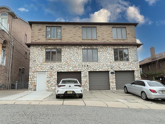 Unit 3 includes a garage spot and a tandem parking space in front