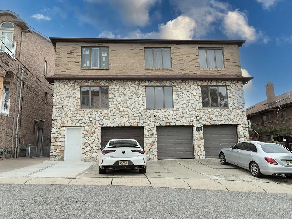 Unit 3 includes a garage spot and a tandem parking space in front
