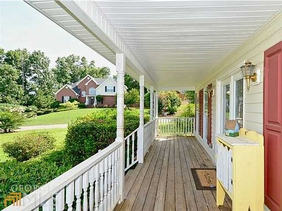 Enjoy afternoon lemonade or evening coffee of rocking chair front porch