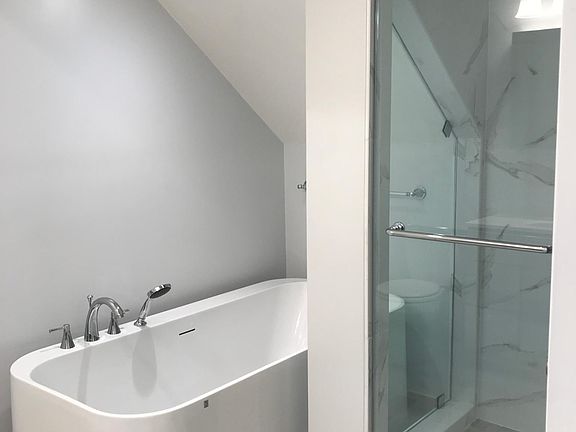 Bathroom: The recently remodeled bathroom has a walk-in shower and deep soaking tub.