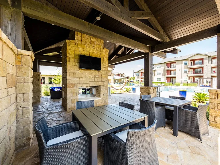 Lounge Area with Fireplace and BBQ Area
