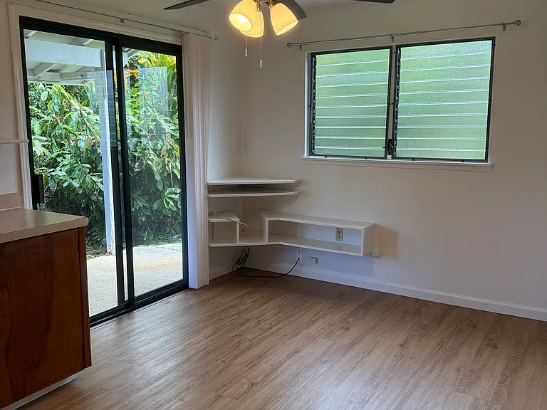Living room space with built in shelves