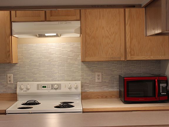 Kitchen with back spalsh, new lights