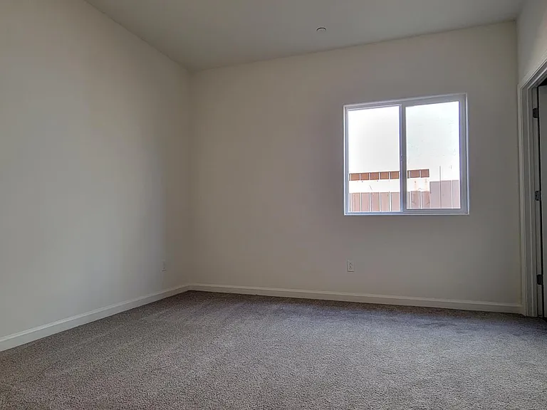 Secondary Bedroom (with fully attached bath and walk-in closet)