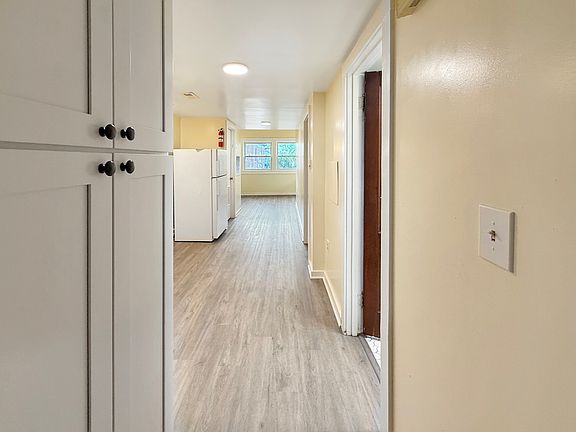 hallway to kitchen, door to bathroom #2 on the right