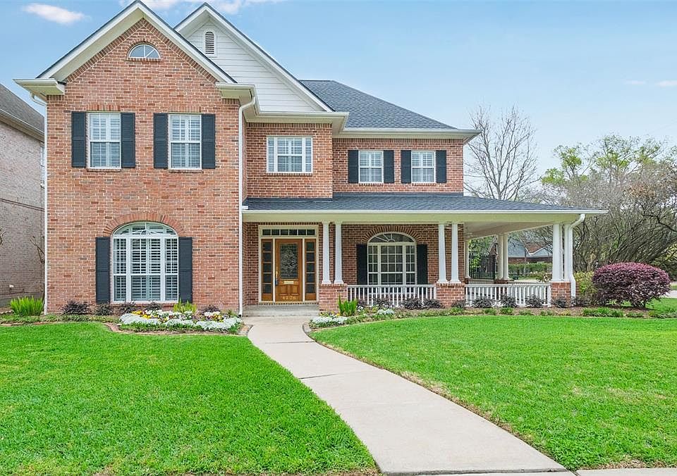 Welcome Home to 4126 Cason - located on a large corner lot with rare three car garage and garage apartment.