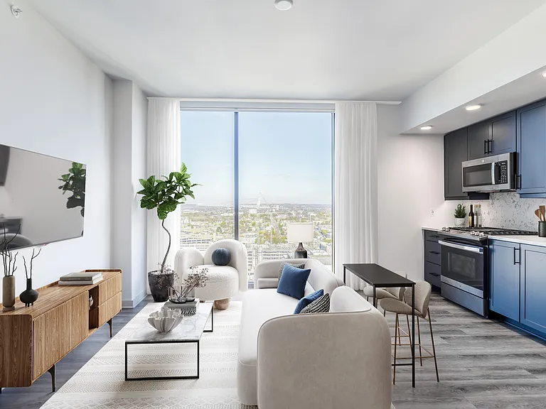 Studio with Floor to Ceiling Windows with a View of the City.
