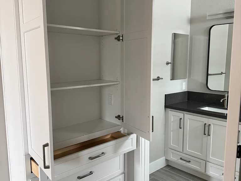 Storage cabinet/drawers outside bathroom