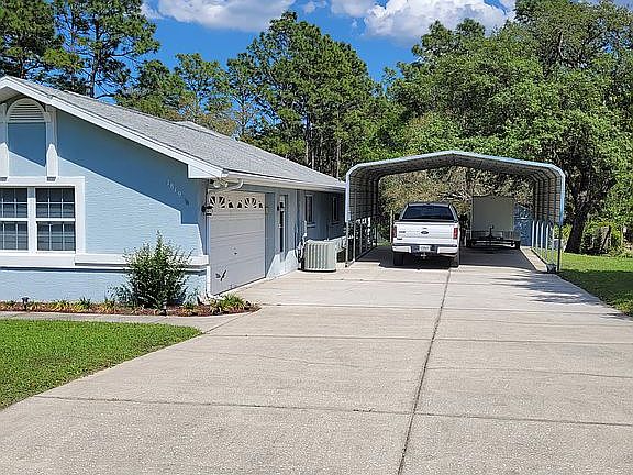 2 car garage plus a carport