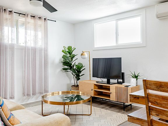 Gather around your cozy living room equipped with high powered air conditioning.