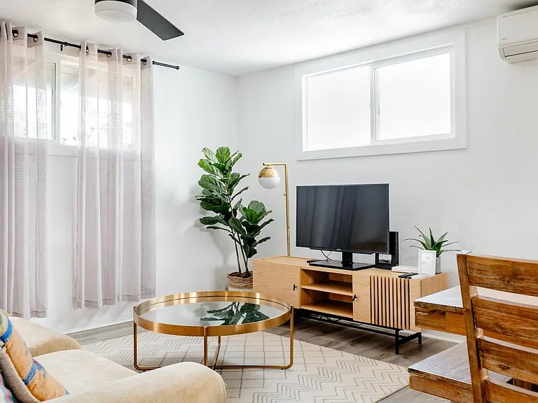 Gather around your cozy living room equipped with high powered air conditioning.