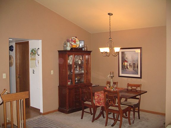 dining room and doorway into kitchen, the closed door is to the laundry room