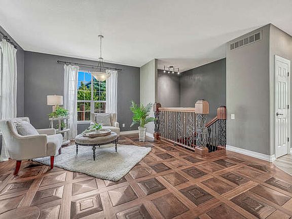 Custom finishes throughout including award-winning flooring and handrail/stairs to finished basement.