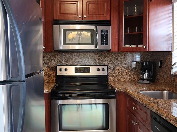 Kitchen with Wooden Cabinetry