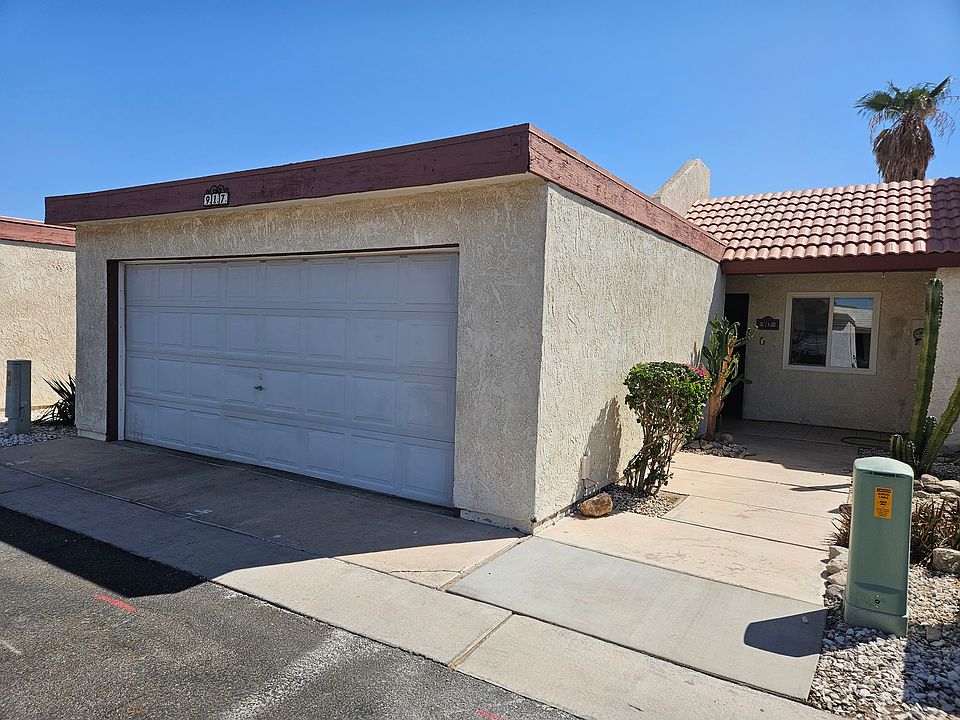 Front of condo. 2 car garage