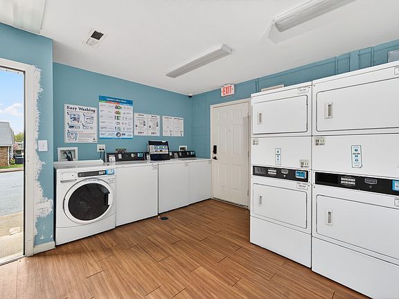 Laundry hookups in unit and shared laundry facility on site.