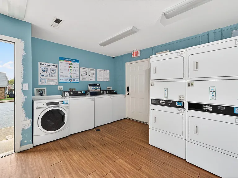 Laundry hookups in unit and shared laundry facility on site.