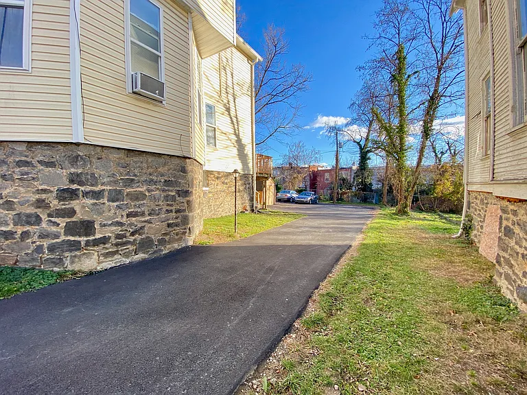 Optional private reserved parking at adjacent backyard