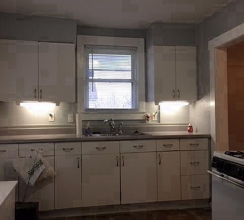 kitchen, gas range, refrigerator, pantry