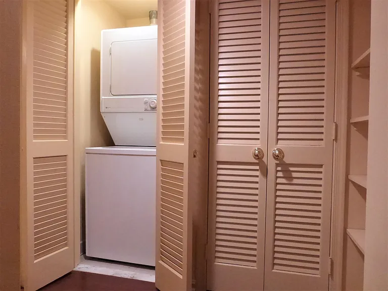 The unit features its own washer/dryer and plenty of closets
