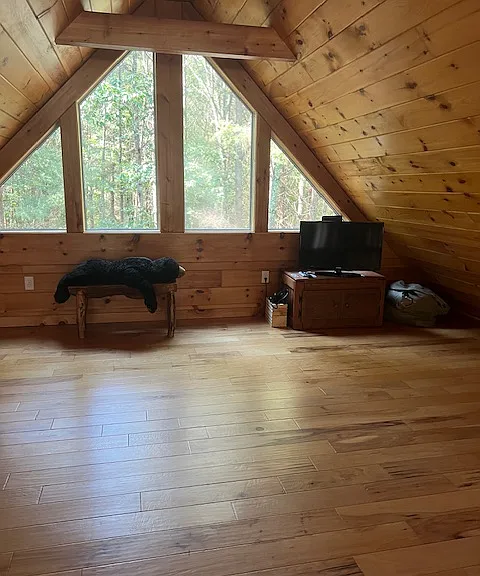 Our loft is pretty empty so very usable space ! There is a queen size air bed with automatic pump to fill...great for guests. Awesome space for an office or extra bedroom.