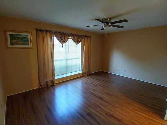 Left bedroom with curtains