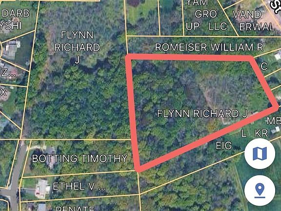 4.4 acre lot is adjoining and to the East