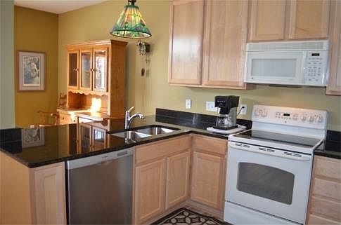 Kitchen area is conveniently open to the dining area.