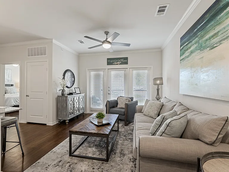 Open living spaces create a welcoming atmosphere at Auberge of Burleson.
