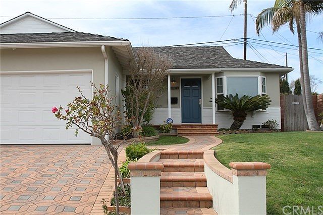 Lovely Curb Appeal Enhanced with Simple Landscape, Interlocking Driveway and Walkway.