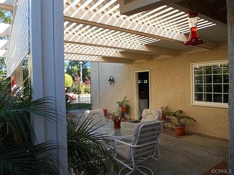 Specially designed and permitted cover above garage entry to fro