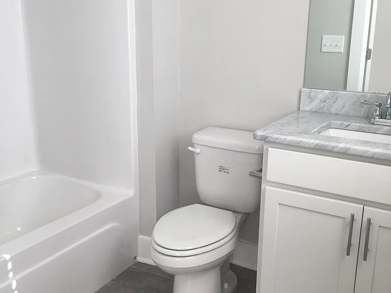Attached bathroom in second bedroom.