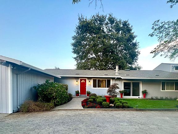 View of your freshly painted ranch style home.