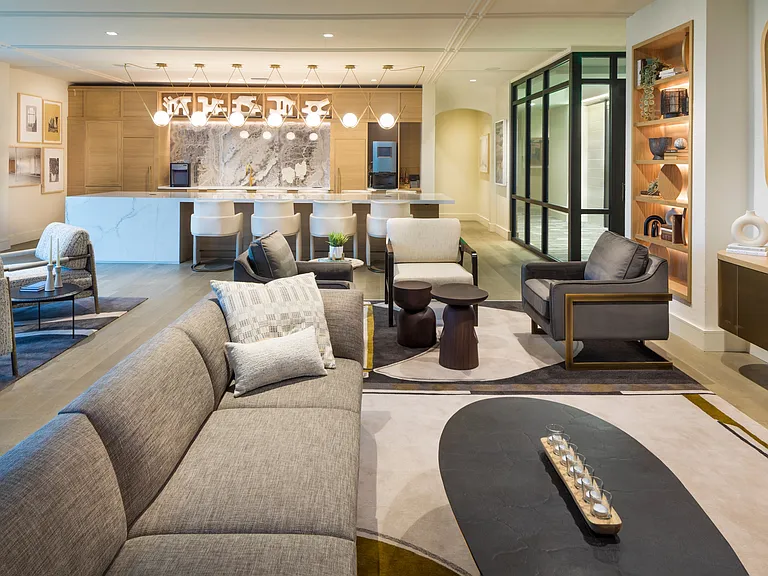 Socialize and unwind in our inviting clubroom, equipped with a demonstration kitchen, coffee bar, and wine dispenser