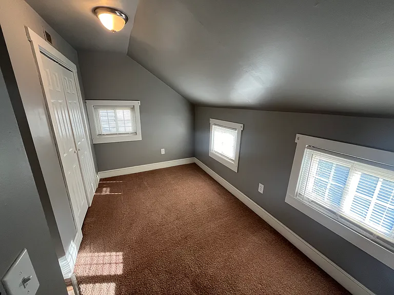 Bedroom 2 (this is a pass-through bedroom) with closet.